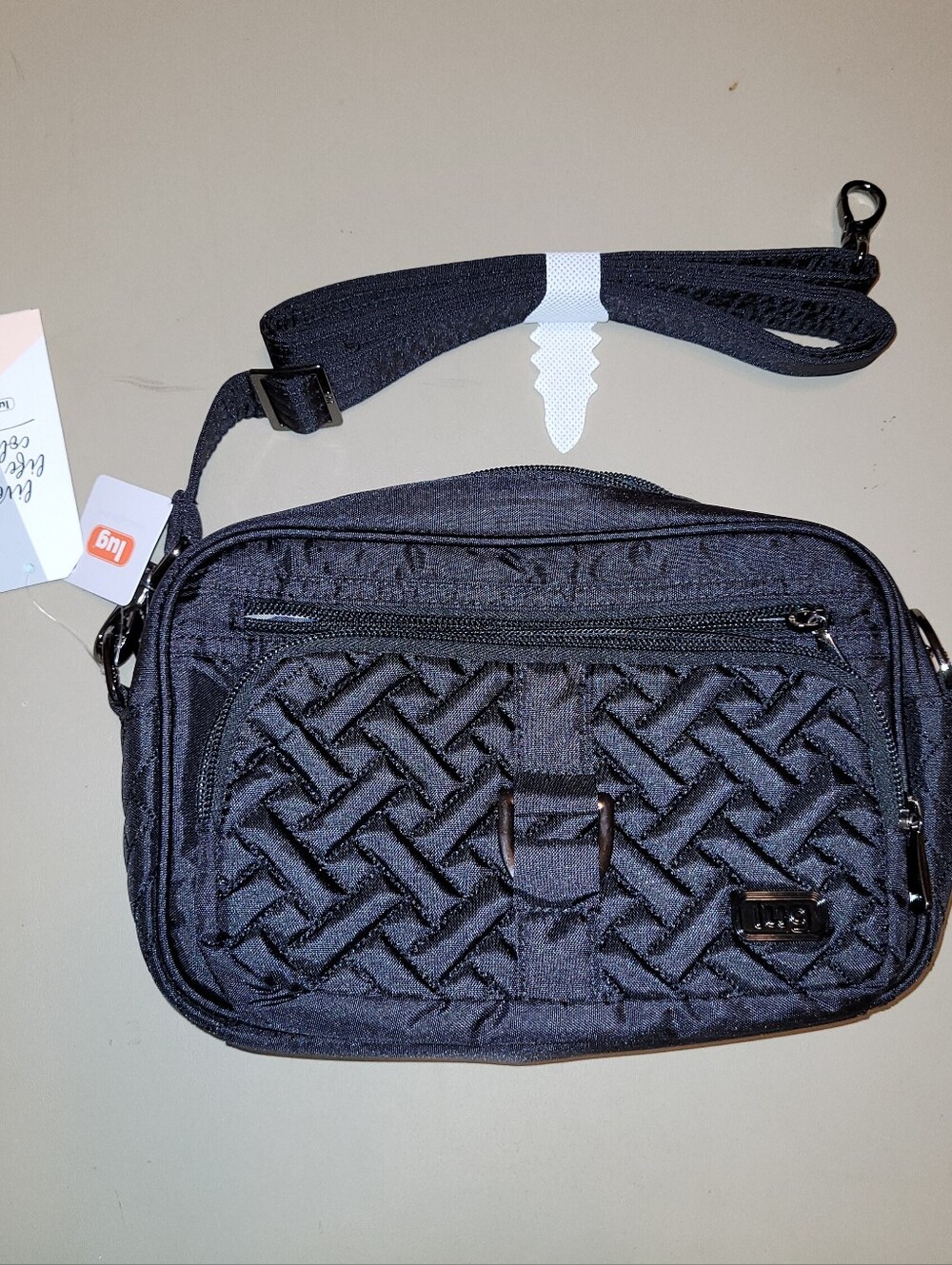 NWT Lug Carousel - Black Crossbody Bag - Quilted Front, Multiple Zip Pockets.